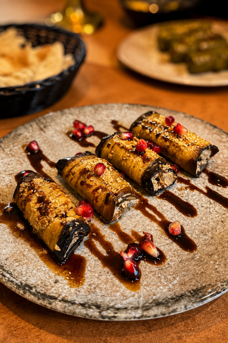 Eggplant rolls finished with pomegranate